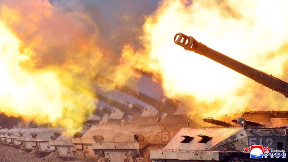 epa09569300 A photo released by the official North Korean Central News Agency (KCNA) shows an artillery fire competition involving artillery sub-units under mechanized troops at all levels of the Korean People's Army, at an undisclosed location in North Korea, 06 November 2021 (issued 07 November 2021).  EPA/KCNA   EDITORIAL USE ONLY