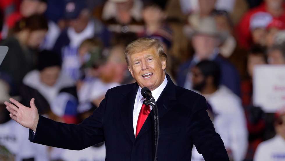 epa09717400 Former US president Donald Trump speaks at a Save America Rally, held outdoors at the Montgomery County Fairgrounds in Conroe, Texas, USA, 29 January 2022. Trump has been holding rallies at various locations as mid-term election races heat up.  EPA/MICHAEL WYKE