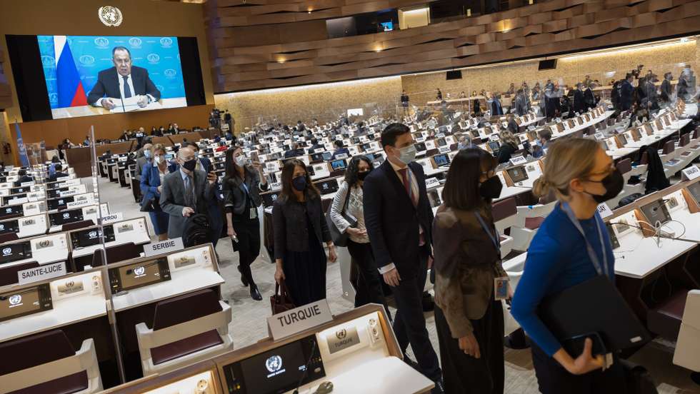 epa09840194 (FILE) - Ambassadors and diplomats walk out while Russia's foreign minister Sergei Lavrov (on screen) speaks during a pre-recorded video message at the 49th session of the UN Human Rights Council at the European headquarters of the United Nations in Geneva, Switzerland, 01 March 2022 (issued 21 March 2022). The diplomats got up and left the room when Sergei Lavrov's pre-recorded video message began to play, in protest against Russia's invasion of Ukraine. Since Russia invaded Ukraine one month ago on 24Â February 2022, more than three million Ukrainians became refugees and two million are internally displaced, the United Nations said.  EPA/SALVATORE DI NOLFI / POOL  ATTENTION: This Image is part of a PHOTO SET