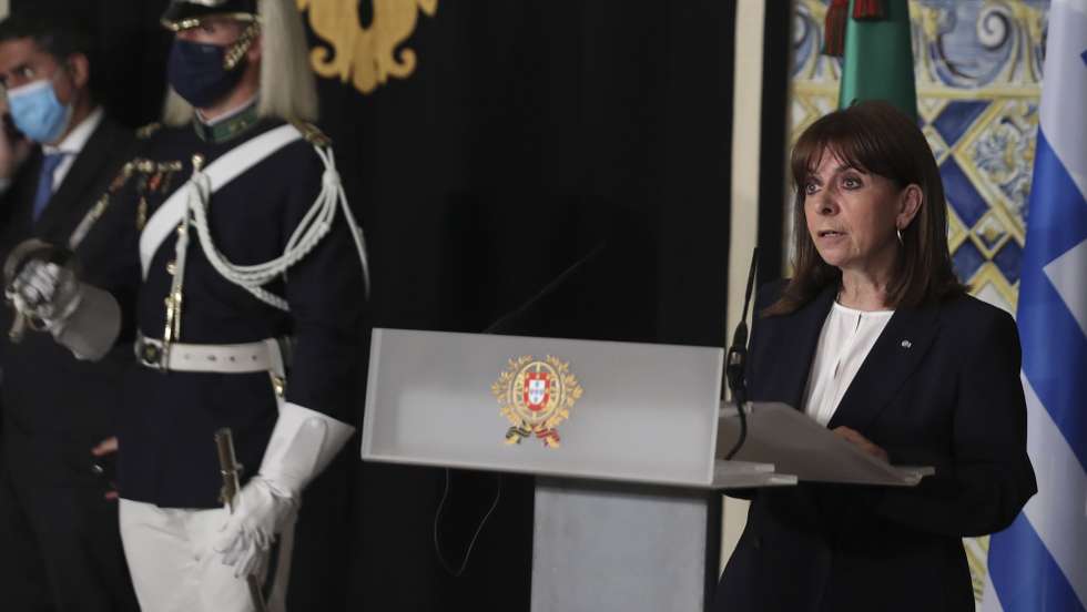 epa09856357 Greek President Katerina Sakellaropoulou and President of Portugal Marcelo Rebelo de Sousa (not pictured) during a press conference at Belem Palace, in Lisbon, Portugal, 28 March 2022. Katerina Sakellaropoulou is on a three days official visit in Lisbon.  EPA/ANTONIO COTRIM