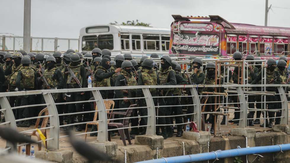 epa10085806 Sri Lankan Army soldiers block and guard the access road of the President's secretariat, after the protesters were forcibly evicted from the premises, in Colombo, Sri Lanka,  22 July 2022. The Sri Lankan parliament elected Ranil Wickremesinghe as the new President of Sri Lanka on 20 July, after accepting the resignation of President Gotabaya Rajapaksa who fled to Singapore through the Maldives following months of anti-government protests fueled by the ongoing economic crisis. Protests have been affecting the country for over four months as Sri Lanka faces its worst-ever economic crisis in decades due to the lack of foreign reserves, resulting in severe shortages in food, fuel, medicine, and imported goods.  EPA/CHAMILA KARUNARATHNE
