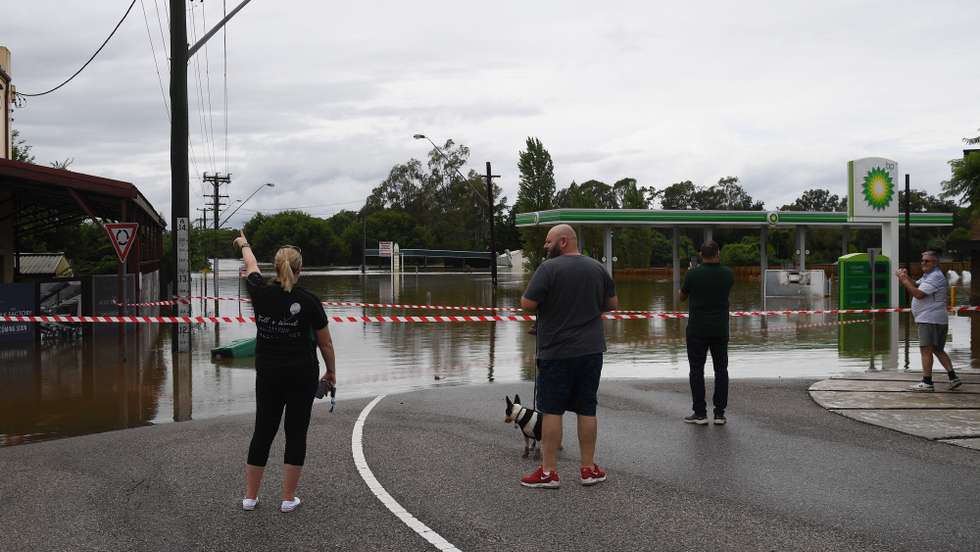 epa09808816 Floodwaters inundate Camden, South Western Sydney, New South Wales, Australia, 08 March 2022. People in south and southwestern Sydney suburbs have been told to evacuate as quickly as possible amid warnings rain could lead to more flooding and landslide.  EPA/DEAN LEWINS AUSTRALIA AND NEW ZEALAND OUT