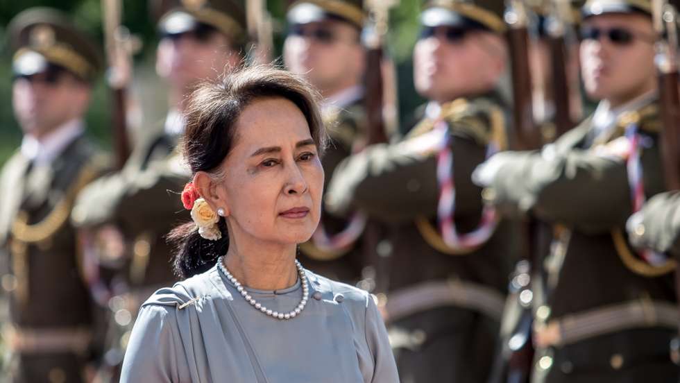 epa09676614 (FILE) - Myanmar's State Counselor Aung San Suu Kyi inspects a guard of honor during a welcome ceremony in Prague, Czech Republic, 03 June 2019 (reissued 10 January 2022).  Myanmar’s ousted civilian leader Aung San Suu Kyi has been convicted of three criminal charges and sentenced to four years in prison in the second round of verdicts handed out by a court on 10 January 2022.  EPA/MARTIN DIVISEK