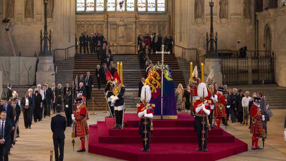 epa10184706 A handout photograph released by the UK Parliament shows the first members of the public attending the Lying-in-State of Britain's Queen Elizabeth II at the Palace of Westminster in London, Britain, 14 September 2022. The queen's lying in state will last for four days, ending on the morning of the state funeral on the 19 September.  EPA/UK PARLIAMENT/ROGER HARRIS HANDOUT -- MANDATORY CREDIT: UK PARLIAMENT/ROGER HARRIS -- HANDOUT EDITORIAL USE ONLY/NO SALES