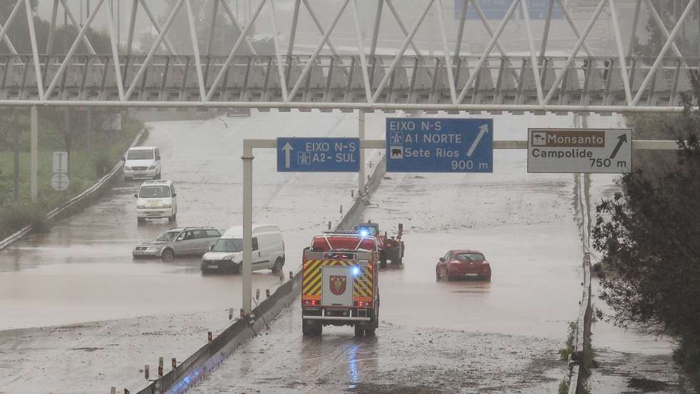 Cars partially submerged in a flooded road after bad weather this early morning in Lisbon, Portugal, 13 December 2022. The national civil protection appealed to citizens today to restrict the maximum displacement because of bad weather, which caused the night today 275 occurrences in the districts of Lisbon and Setubal and should remain until Wednesday. TIAGO PETINGA/LUSA