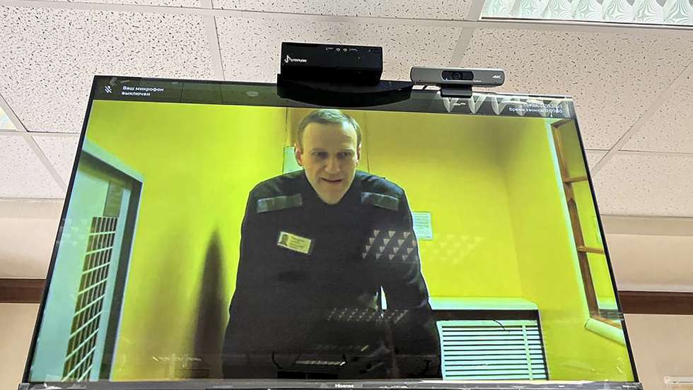 epa10664633 A handout photo made available by Moscow City court press service shows jailed Russian opposition figure Alexei Navalny attending via a video link from his penal colony a preliminary hearing of a new case in the Moscow City court in Moscow, Russia, 31 May 2023. A new case was initiated under six articles - on the organization of an extremist community. Navalny has been in the colony since February 2021, when the court, at the request of the Federal Penitentiary Service, replaced his suspended sentence in the Yves Rocher case of 2014 with a real one. He was supposed to serve in a penal colony for 2 years and 8 months, but in March 2022, the Lefortovo Court of Moscow, at an off-site meeting in correctional colony-2 in the city of Pokrov, Vladimir Region, sentenced the politician to 9 years of strict regime and a fine of 1.2 million rub., as well as one and a half years of restriction of freedom in the case of fraud and contempt of court. In June 2022, the sentence entered into force.  EPA/MOSCOW CITY COURT PRESS SERVICE/HANDOUT -- BEST QUALITY AVAILABLE -- HANDOUT EDITORIAL USE ONLY/NO SALES