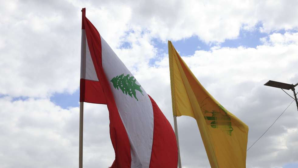 epa12897114 The flags of (L-R) Lebanon and Hezbollah flutter during a solidarity rally with Hezbollah following a Lebanon-Israel ceasefire, in Sana'a, Yemen, 17 April 2026. Thousands of Houthi supporters rallied in Sana'a to voice solidarity with Hezbollah and the people of Lebanon, a day after Lebanon and Israel agreed to a 10-day ceasefire.  EPA/YAHYA ARHAB