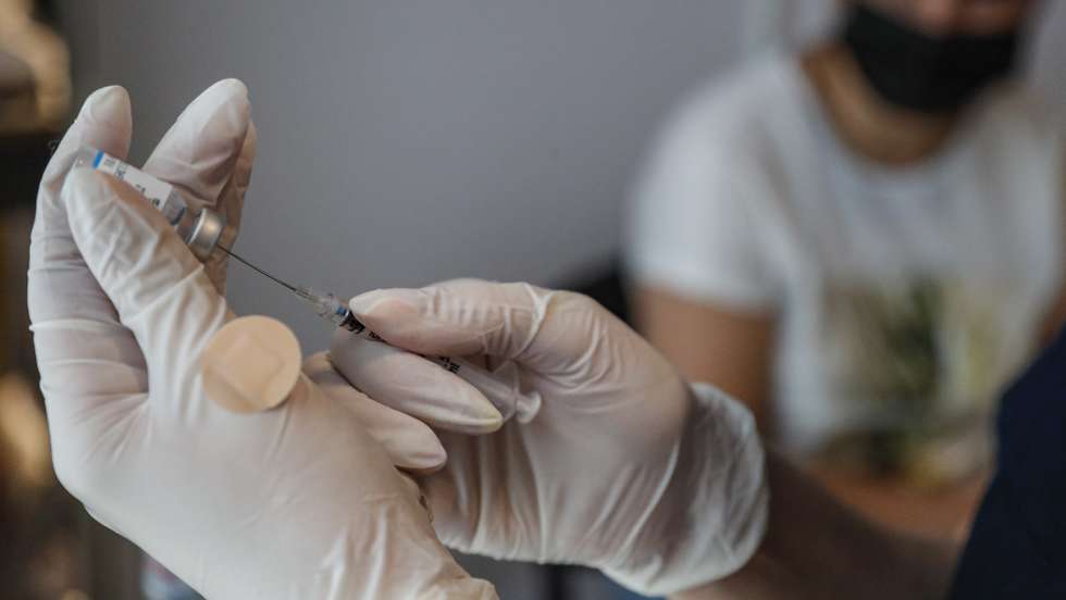 epa09419468 A nurse prepares a dose of Pfizer vaccine against COVID-19 disease at a vaccination center in Tbilisi, Georgia, 18 August 2021. Georgia reported 5,914 coronavirus cases, and 49 deaths on 18 August. US President Joe Biden donated 500,000 doses of US-German vaccine Pfizer to Georgia, the Ministry of Labor, Health and Social Affairs of Georgia reports. This drug is enough to vaccinate 250 thousand citizens. In Georgia, only 1.5 percent were fully vaccinated. China has supplied 1.5 million Sinovac and Sinofarm vaccines to Georgia.  EPA/ZURAB KURTSIKIDZE