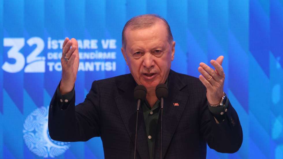 epa12233512 Turkish President Recep Tayyip Erdogan delivers a speech at the 32nd Consultation and Evaluation Meeting in Ankara, Turkey, 12 July 2025. President Erdogan made remarks after the PKK's symbolic disarmament ceremony held on 11 July.  EPA/NECATI SAVAS