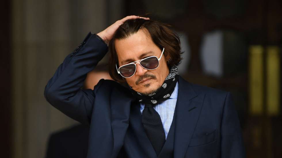 epa08792649 (FILE) - US actor Johnny Depp arrives at the Royal Courts of Justice in London, Britain, 14 July 2020 (reissued 02 November 2020). The UK High Court ruled against Depp in his libel trial against The Sun's newspaper publisher News Group Newspapers (NGN) over claims he abused his ex-wife, US actress Amber Heard, media reports state on 02 November 2020.  EPA/NEIL HALL *** Local Caption *** 56213511