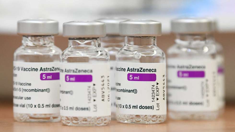 epa09086149 Empty vials of the AstraZeneca Covid-19 vaccine sit on a table at a general practitioner in Ede, the Netherlands, 20 March 2021. EU member countries reintroduced the AstraZeneca Covid-19 vaccine in their inoculation campaigns following the European Medicines Agency (EMA) announcement of 18 March to uphold its approval of the vaccine. Some countries stopped giving the vaccine over fears there might be links between the vaccination against Covid-19 with the AstraZeneca vaccine and a rare number of blood clots.  EPA/Piroschka van de Wouw
