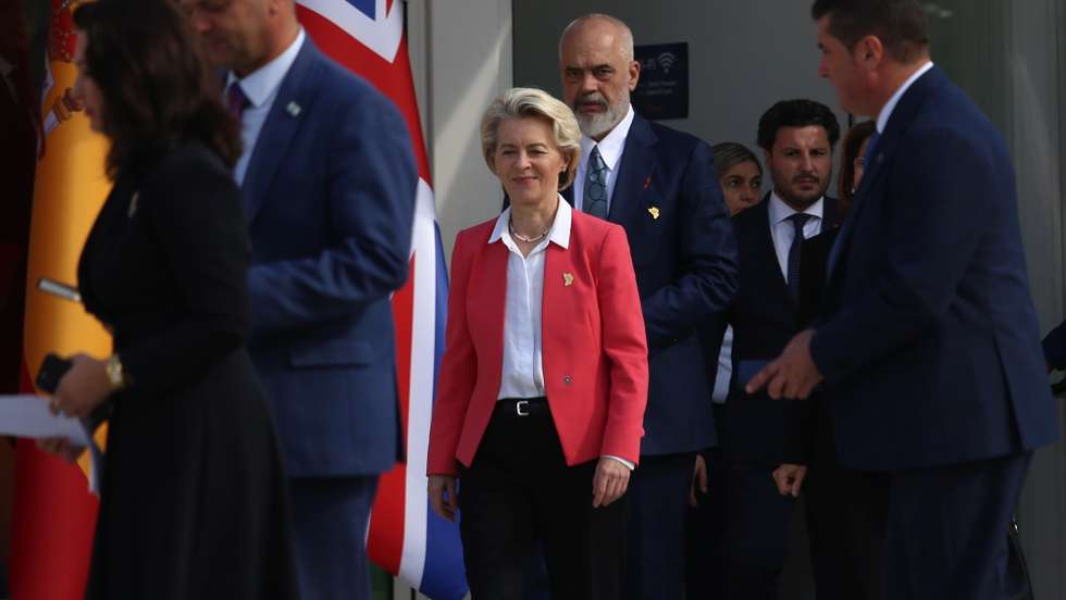 epa10921880 European Commission President Ursula von der Leyen (L) and Albania's Prime Minister Edi Rama (R) arrive for a group photo during the Berlin Process - Leaders' Summit in Tirana, Albania, 16 October 2023. The Berlin process, an initiative for high-level cooperation between high official representatives of the Western Balkan countries and the European Union, closely linked to the future enlargement of the block is for the first time since it started in 2014 held in a country that is not part of the EU.  EPA/MALTON DIBRA