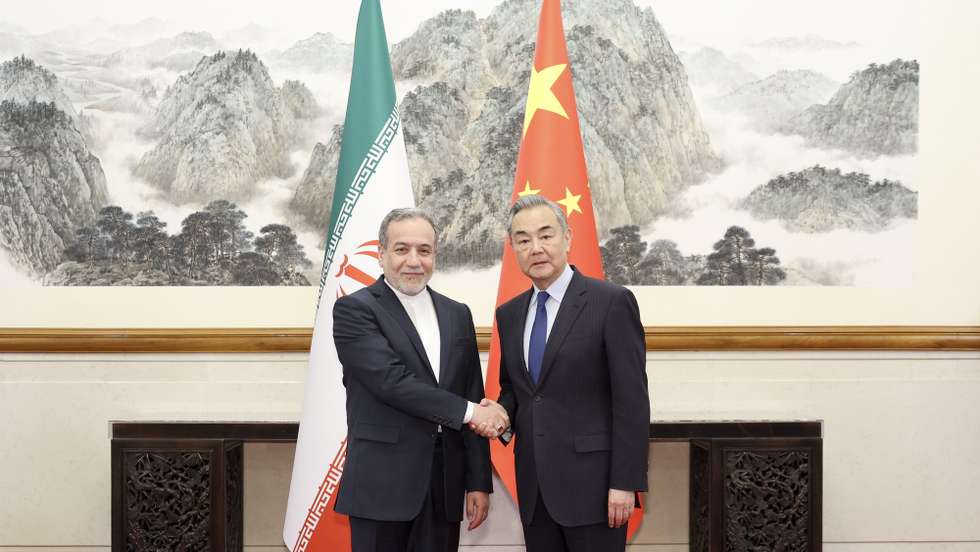 epa12049474 Chinese Foreign Minister Wang Yi (R), also a member of the Political Bureau of the Communist Party of China Central Committee, holds talks with Iranian Foreign Minister Seyed Abbas Araghchi in Beijing, China, 23 April 2025.  EPA/XINHUA / DING HAITAO CHINA OUT / UK AND IRELAND OUT  /       MANDATORY CREDIT EDITORIAL USE ONLY