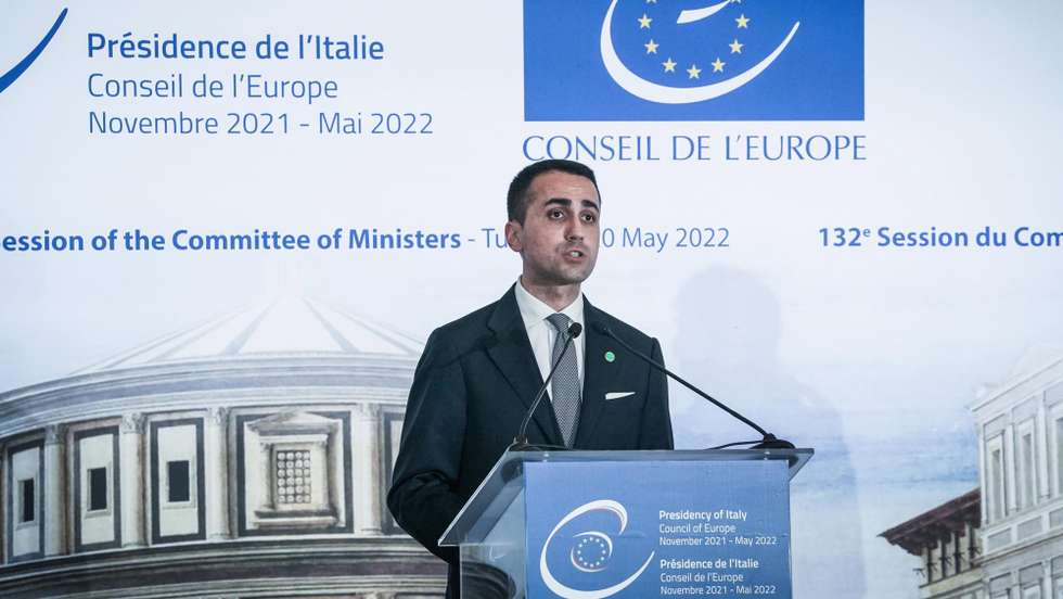 epa09960464 Italian Minister of Foreign Affairs Luigi Di Maio attends a news conference with Irish Minister of Foreign Affairs Simon Coveney and Secretary General of the Council of Europe Marija Pejcinovic Buric (not pictured) at the 132nd session of the Committee of Foreign Ministers of the Council of Europe at the Reggia di Venaria Reale in Turin, Italy, 20 May 2022.  EPA/Tino Romano