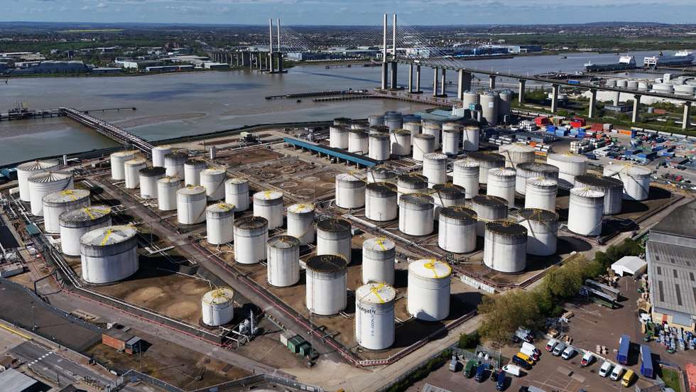 epaselect epa12889044 An image made with a drone shows oil gas and fuel storage units at the Navigator Terminal in Grays, Britain, 14 April 2026. Oil prices have risen above 100 US dollars a barrel again as the US Navy begins a blockade of the Strait of Hormuz following the collapse of ceasefire negotiations between Iran and the United States. Meanwhile, leasing of electric vehicles has surged across Europe amid rising petrol prices linked to the Iran war.  EPA/NEIL HALL