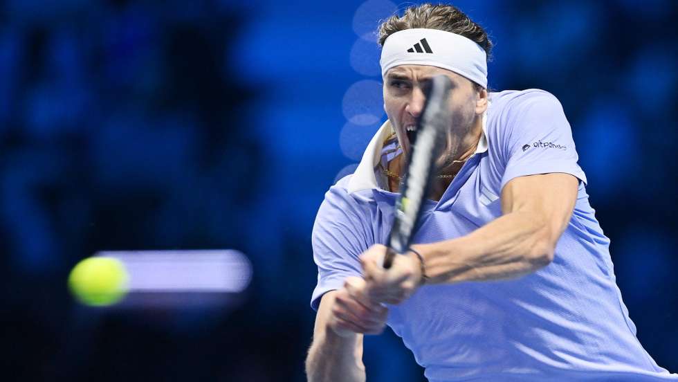 epa11722823 Alexander Zverev of Germany in action during his ATP Finals round robin match against Carlos Alcaraz of Spain in Turin, Italy, 15 November 2024.  EPA/Alessandro Di Marco
