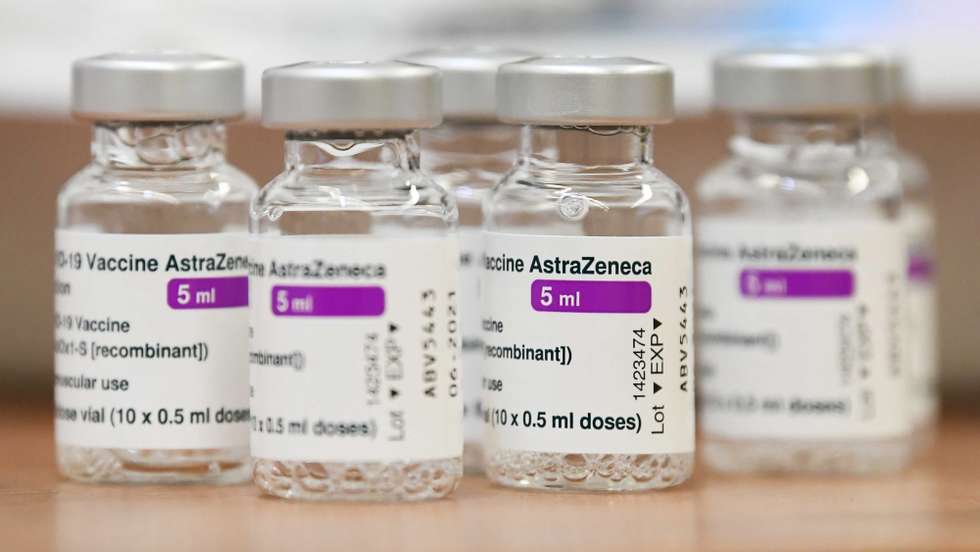 epa09086149 Empty vials of the AstraZeneca Covid-19 vaccine sit on a table at a general practitioner in Ede, the Netherlands, 20 March 2021. EU member countries reintroduced the AstraZeneca Covid-19 vaccine in their inoculation campaigns following the European Medicines Agency (EMA) announcement of 18 March to uphold its approval of the vaccine. Some countries stopped giving the vaccine over fears there might be links between the vaccination against Covid-19 with the AstraZeneca vaccine and a rare number of blood clots.  EPA/Piroschka van de Wouw