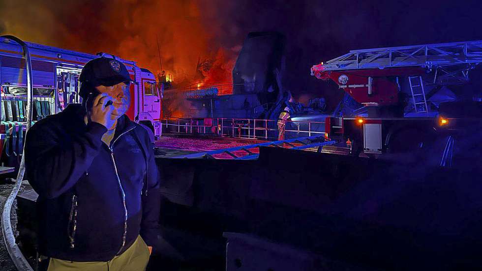 epa10858001 A handout picture made available by the Governor of Sevastopol Mikhail Razvozhaev's telegram channel shows Mikhail Razvozhaev speaking on the phone at the scene of a missile attack on the Sevastopol Shipyard in Crimea, 13 September 2023. At least 24 people were injured, the governor said. According to the Russian Defense Ministry, the Ukrainian Armed Forces launched a strike with ten cruise missiles at the ship repair plant named after. S. Ordzhonikidze in the city of Sevastopol and three unmanned boats from a detachment of ships of the Black Sea Fleet. Air defense systems shot down seven cruise missiles, while two Russian patrol ships were damaged.  EPA/GOVERNOR OF SEVASTOPOL MIKHAIL RAZVOZHAEV HANDOUT HANDOUT EDITORIAL USE ONLY/NO SALES HANDOUT EDITORIAL USE ONLY/NO SALES