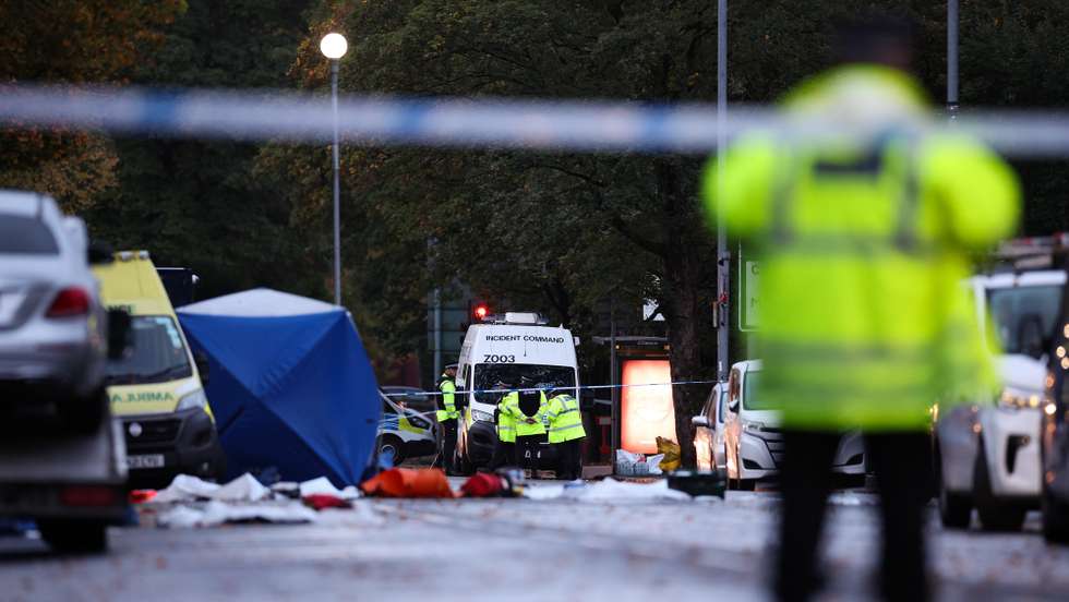 epa12426617 Police officers work at the scene of a fatal terror attack in Manchester, Britain, 03 October 2025. Two people died after a car and stabbing attack at a synagogue in Manchester on 02 October, and the attacker, who has been named as 35-year-old British citizen Jihad Al-Shamie, was shot by police.  EPA/ADAM VAUGHAN