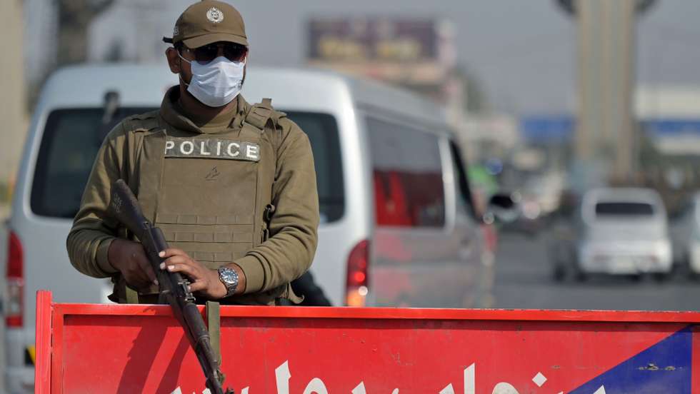 epa11753307 A policeman stands guard at a checkpoint, in Lahore, Pakistan, 02 December 2024. Pakistan experienced a surge in violence, with at least 245 fatalities, including 68 security personnel, in November, according to the Pakistan Institute for Conflict and Security Studies. The month marked the deadliest for security forces this year, with 68 personnel killed, surpassing October's toll of 62. Notably, 131 deaths resulted from militant attacks, predominantly in Khyber Pakhtunkhwa province, which was the most affected region. The report also indicated a rise in militant activities, with 71 attacks recorded in November, leading to over 1,000 deaths from such attacks in the first 11 months of 2024, highlighting the escalating security challenges in the country.  EPA/RAHAT DAR