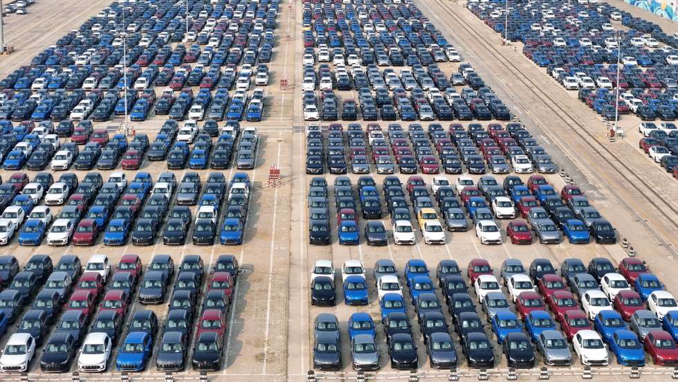 epa12229678 An aerial drone photo taken on July 10, 2025 shows vehicles for export at Yantai Port in east China's Shandong Province. China's auto production and sales logged double-digit increases in the first half of the year (H1), a sign of vibrant domestic consumption in the world's second-largest economy, data from the China Association of Automobile Manufacturers (CAAM) showed on Thursday. The country's auto output totaled 15.62 million units during the period, up 12.5 percent from a year ago, while auto sales rose 11.4 percent to 15.65 million units.  EPA/XINHUA / Tang Ke CHINA OUT / UK AND IRELAND OUT  /       MANDATORY CREDIT EDITORIAL USE ONLY