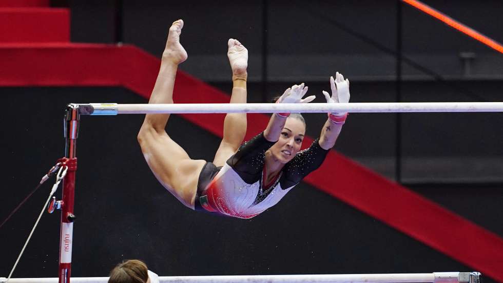 epa09536368 Filipa Martins of Portugal fails to grab the bar as she performs the uneven bars during the Women's All-Around Final at the 50th FIG Artistic Gymnastics World Championships in​ Kitakyushu, Japan, 21 October 2021.  EPA/KIMIMASA MAYAMA
