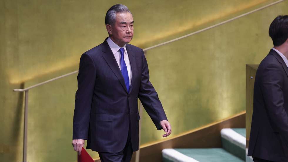 epa11621118 Foreign Minister of the People's Republic of China Wang Yi (L) approaches the podium to speak during the 'Summit of the Future' being held in advance of this week’s General Debate of the 79th session of the United Nations General Assembly at United Nations Headquarters in New York, New York, USA, 23 September 2024.  EPA/SARAH YENESEL