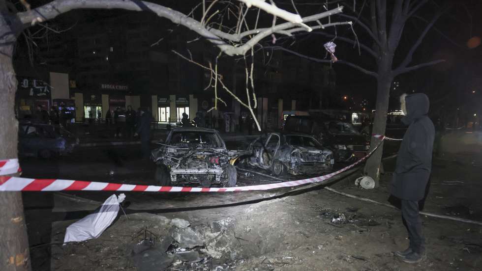 epaselect epa12703070 A person stands near the site of a Russian drone strike in Zaporizhzhia, southeastern Ukraine, 03 February 2026, amid the Russian invasion. At least two people, a young man and woman, were killed and at least seven others injured, including two children, after a drone struck near a marketplace and residential buildings, according to Ukraine's National Police.  EPA/OLEG MOVCHANIUK