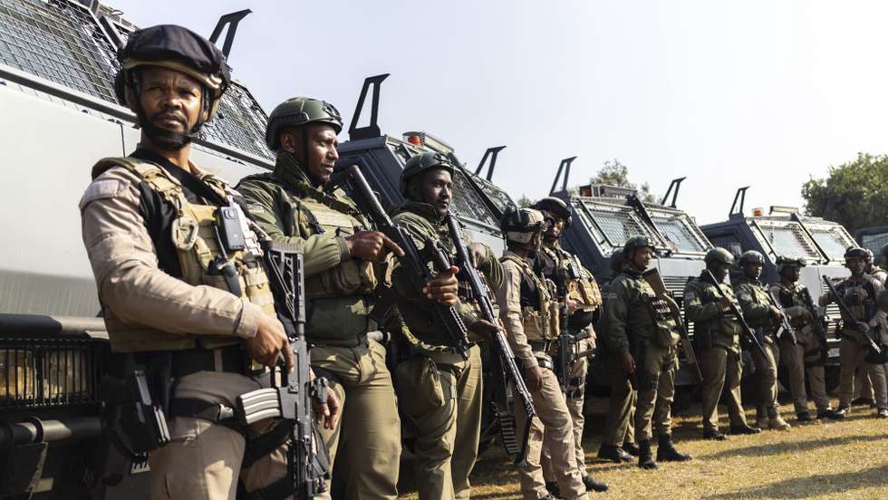 epa13066595 Members of private security gather during a deployment parade prior to the nationwide anti-immigrant movement national shutdown, in Johannesburg, South Africa, 26 June 2026. The deployment of the SAPS and private security companies is in response to the nationwide anti-migrant movement that is planning a nationwide shutdown on 30 June as part of its deadline that all immigrants should leave South Africa by that day.  EPA/KIM LUDBROOK