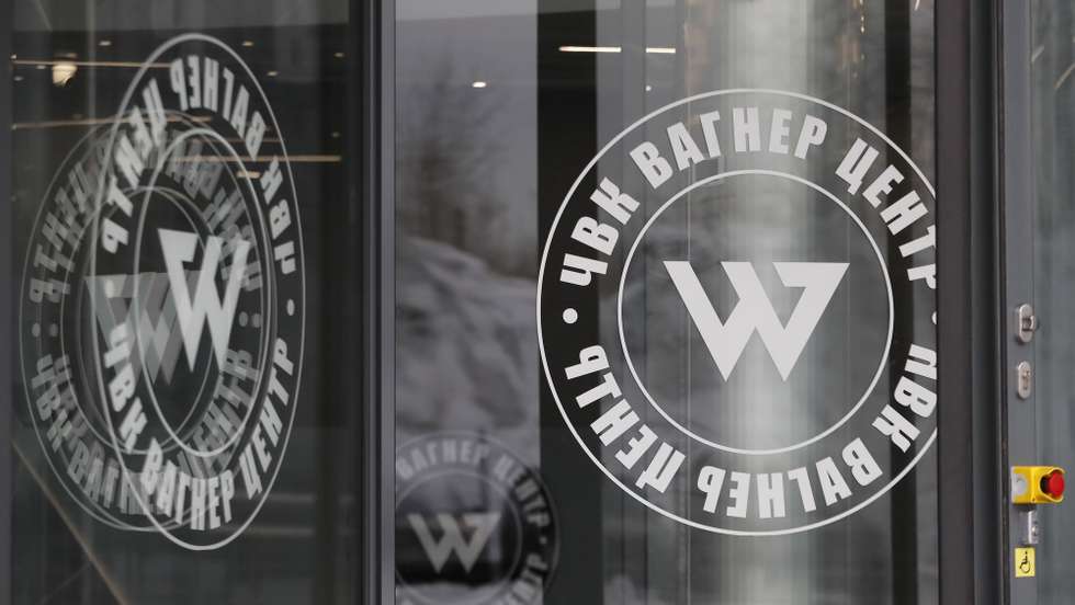 epa10445452 Logos of the PMC Wagner Center pictured at the building, headquarters of the Wagner Group in St. Petersburg, Russia, 03 February 2023. According to a Ukrainian government publication from 03 February 2023, Ukraine's prosecutor general summoned Evgeny Prigozhin as a suspect in criminal proceedings. Prigozhin according to a US Treasury sanctions announcement leads the Russian private military company PMC Wagner that was sanctioned by the US Treasury on 26 January 2023.  EPA/ANATOLY MALTSEV