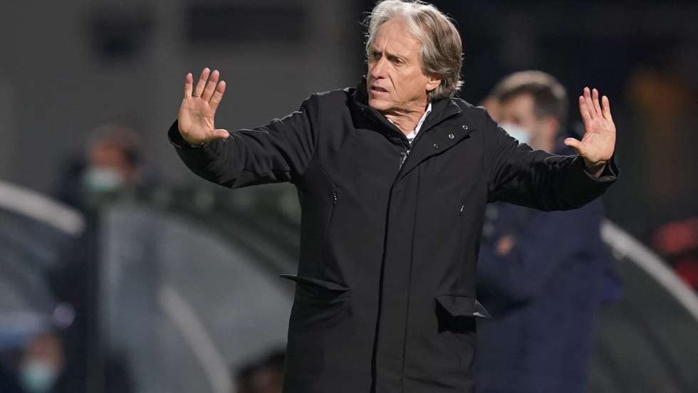 epa09639230 Benfica´s head coach Jorge Jesus reacts during the Portuguese first league soccer match between FC Famalicao vs Benfica, held at Municipal Famalicao stadium in Famalicao, Portugal, 12 December 2021.  EPA/HUGO DELGADO