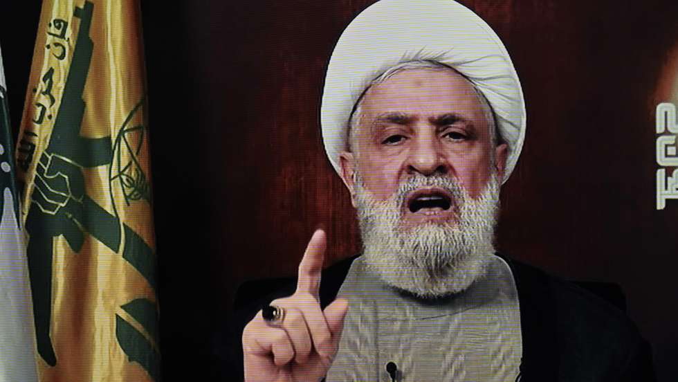 epa11748234 A photo of a TV screen shows Hezbollah leader Sheikh Naim Qassem delivering a televised speech broadcasted on Hezbollah's al-Manar TV channel, in Beirut, Lebanon,  29 November 2024. A 60-day ceasefire agreement between Israel and Hezbollah came into force on 27 November.  EPA/WAEL HAMZEH