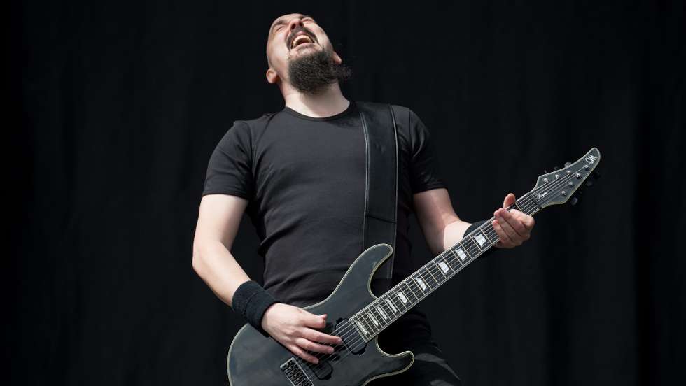 epa04775871 Aaron Aedy, guitarist of British Gothic metal band Paradise Lost performs on stage during the 'Rock im Revier' music festival at the Veltins-Arena in Gelsenkirchen, Germany, 30 May 2015. The event runs from 29 to 31 May.  EPA/FRISO GENTSCH