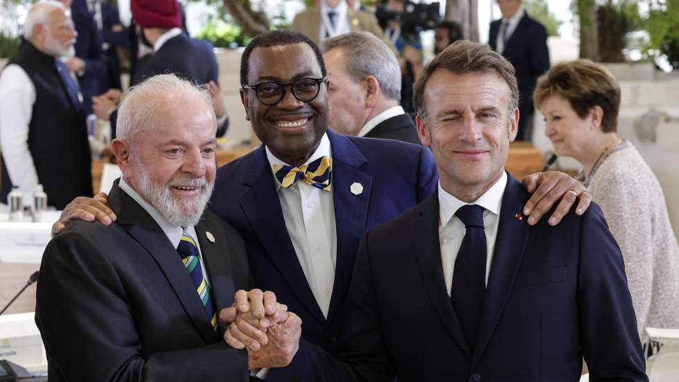 epa11410021 (L-R) Brazilian President Luis Ignacio Lula da Silva, African Development Bank (AFDB) President Akinwumi Adesina and French President Emmanuel Macron attend 'Session VI: Artificial intelligence, energy, Africa-Mediterranean' on the second day of the G7 summit, in Borgo Egnazia, Apulia region, southern Italy, 14 June 2024. The 50th G7 Summit brings together the Group of Seven member states leaders in Borgo Egnazia resort from 13 to 15 June 2024.  EPA/GIUSEPPE LAMI