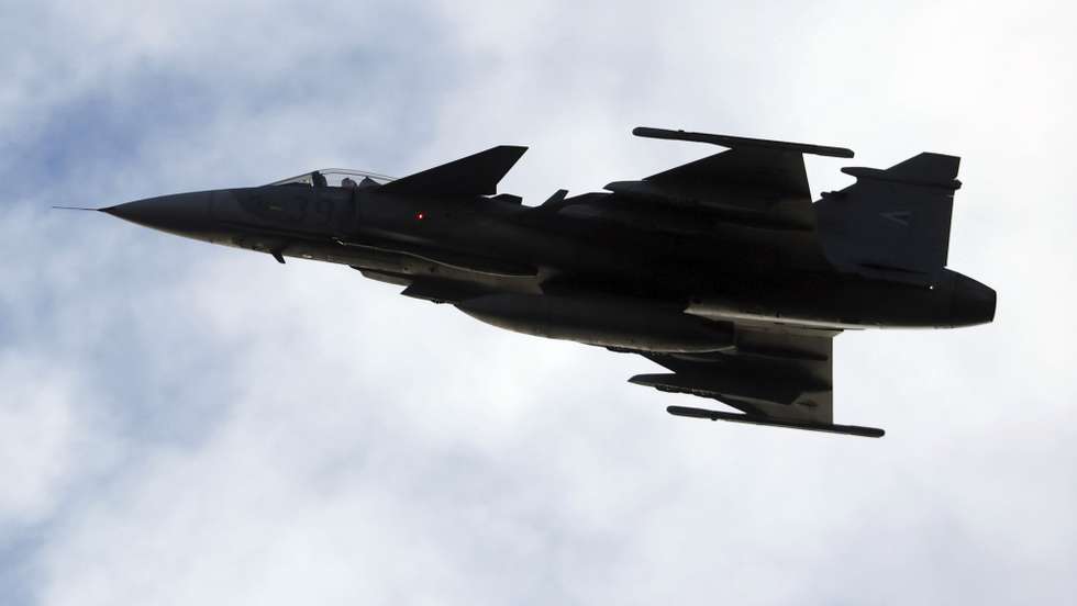 epa12533731 The Hungarian Air Force JAS-39 Gripen fighter jet performs during the Independence Day national defence parade in Riga, Latvia, 18 November 2025. The National Armed Forces, allied units, and services participated in the parade dedicated to the 107th anniversary of the proclamation of the Republic of Latvia. This year, the parade has a new name, reflecting Latvia's comprehensive national defence system and the significant contribution of allied countries to the nation's security.  EPA/TOMS KALNINS