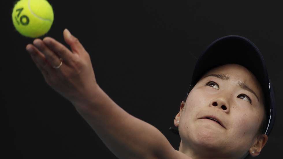 epa08146100 Nao Hibino of Japan serves during her women's singles first round match against Peng Shuai of China at the Australian Open Grand Slam tennis tournament in Melbourne, Australia, 21 January 2020. EPA/FRANCIS MALASIG