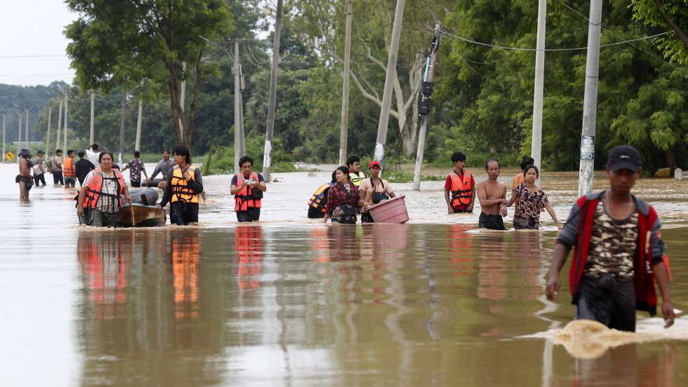 epa11603208 Rescue volunteers help flood victims in Taungoo, Bago division, Myanmar, 14 September 2024. Heavy rains triggered by Typhoon Yagi have caused severe flooding in parts of Myanmar, leaving thousands stranded in their homes, with further heavy rainfall and thunderstorms expected, according to the state weather office. A statement from the Military announced 59,413 households were affected in 34 townships and set up 187 relief camps for the 236,649 people. There were 33 casualties due to the flood in the country including the Naypyitaw.  EPA/NYEIN CHAN NAING