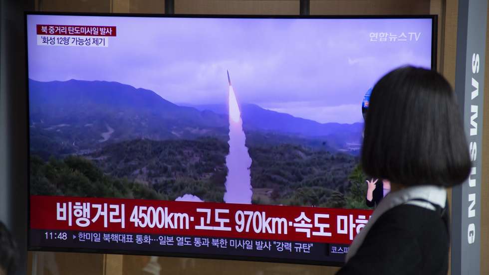 epa10222065 A woman watches the news at a station in Seoul, South Korea, 04 October 2022. According to South Korea's Joint Chiefs of Staff (JCS), North Korea launched a ballistic missile over Japan into the Pacific Ocean.  EPA/JEON HEON-KYUN