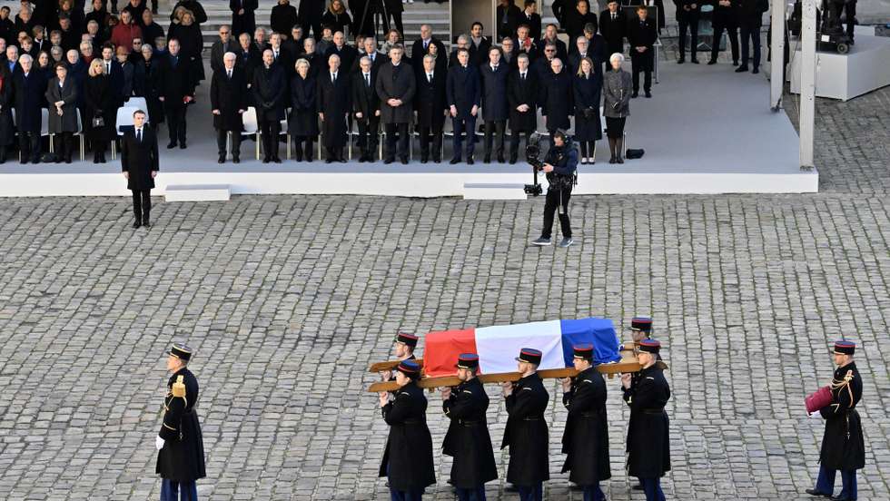 epa11058646 French President Emmanuel Macron (4-L) and various European political figures pay their respects as they attend the national tribute ceremony to late French former European Commission President Jacques Delors at the Hotel des Invalides in Paris, France, 05 January 2024. The former European Commission President and architect of the modern EU has died at age 98 on 27 December 2023.  EPA/Alessandro Di Meo