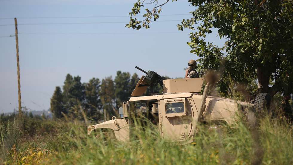 epa10902267 Lebanese army soldiers patrol in the area of Wadi Khaled, during a tour by the Lebanese army at the northern Lebanese-Syrian border, where hundreds of Syrian refugees are smuggled illegally, in Akkar, Lebanon, 05 October 2023. Around two million Syrian refugees have entered Lebanon since 2011, according to data by Lebanese General Security. The Lebanese government insists on returning them to Syria due economic and security situation in Lebanon, despite the United Nations High Commissioner for Refugees consideration that the situation in Syria is still unsafe and the return of refugees to their homeland is too dangerous.  EPA/WAEL HAMZEH
