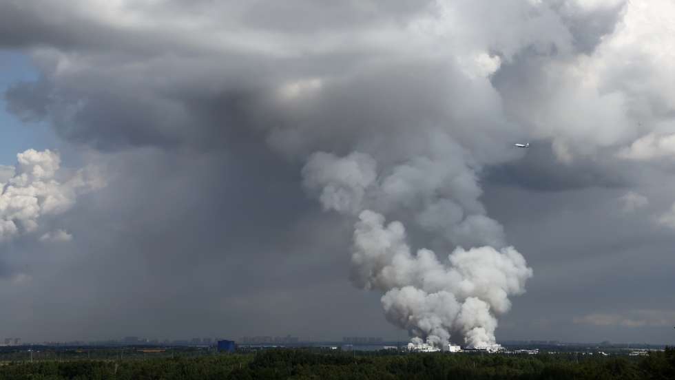 epa13130125 Smoke rises from a fire at a burning warehouse of the Russian internet store Wildberries in Shushary in St. Petersburg, Russia, 24 July 2026. In the night of July 24, the Ukrainian Armed Forces launched a massive drones attack on Wildberries online store warehouses in the Leningrad Region and St. Petersburg. A drone strike caused a fire at Wildberries warehouses in the village of Novosaratovka in the Vsevolozhsk District, Leningrad Region Governor Alexander Drozdenko reported. Three people were injured in moderate condition and are currently receiving medical care.  EPA/STRINGER