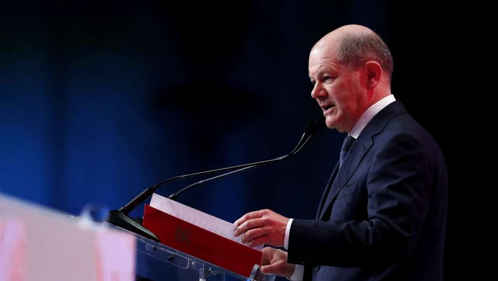 epa11262459 German Chancellor Olaf Scholz delivers a speech at the Party of European Socialists (PES) conference named 'We stand together - for our Europe' held at Parliament Palace in Bucharest, Romania, 06 April 2024. PES is holding a conference and a leaders meeting in Bucharest to present the party candidates for the 2024 European Parliamentary elections to their Romanian colleagues. EU citizens will cast their ballots for the 2024 European Parliament election between 06 and 09 June.  EPA/ROBERT GHEMENT