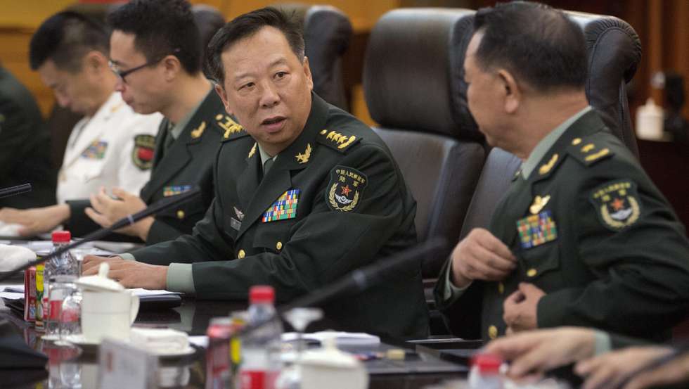 epa05489122 China's People's Liberation Army (PLA) General Li Zuocheng (C) speaks during a meeting with U.S. Army Chief of Staff General Mark Milley (unseen) at the Bayi Building in Beijing, 16 August 2016. Others are not identified. The 39th U.S. Army Chief of Staff is visiting the Asia-Pacific region, including China, South Korea, Japan and Hawaii from 15 to 23 August, according to an U.S. Army press release.  EPA/MARK SCHIEFELBEIN / POOL