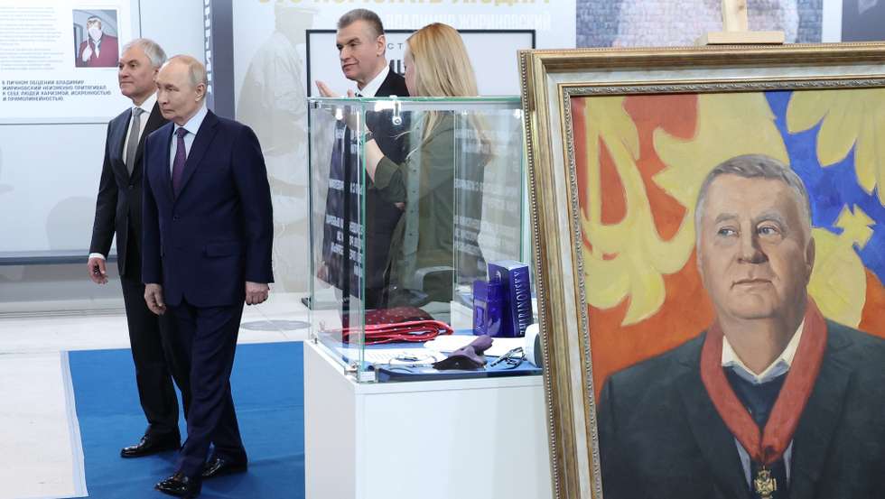 epa12911976 Russian President Vladimir Putin (2nd-L), accompanied by State Duma Speaker Vyacheslav Volodin (L) and LDPR faction head in the State Duma Leonid Slutsky (3rd-L), tours an exhibition marking the 80th birth anniversary of late LDPR leader Vladimir Zhirinovsky at the Manezh Central Exhibition Hall in Moscow, Russia, 24 April 2026.  EPA/VALERIY SHARIFULIN  /SPUTNIK/KREMLIN POOL MANDATORY CREDIT