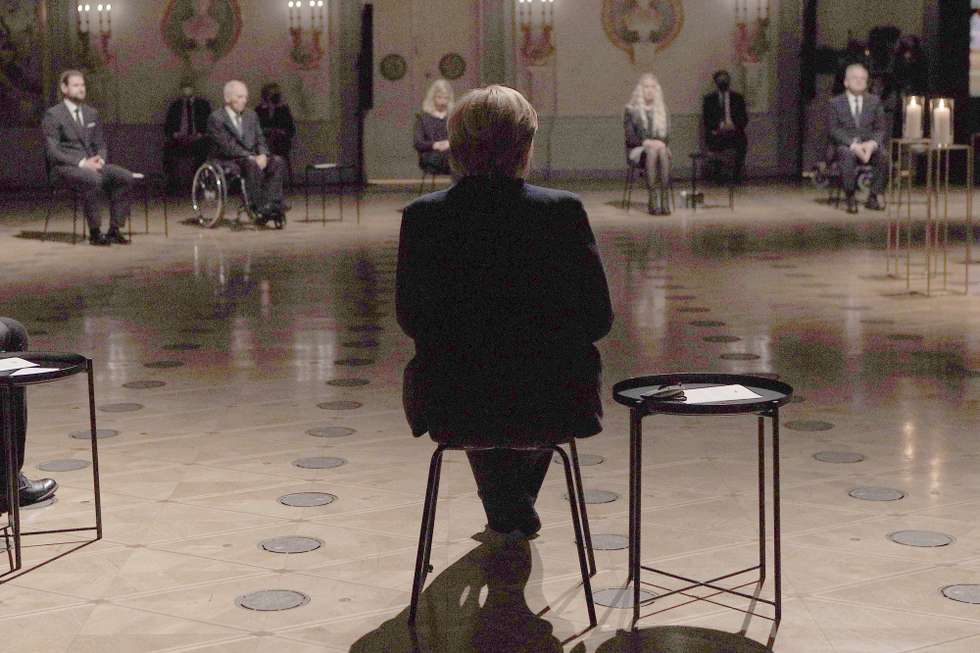 epa09143296 German Chancellor Angela Merkel during the national central mourning act for the deceased during the Corona pandemic at the Konzerthaus Berlin concert hall in Berlin, Germany, 18 April 2021. By initiative of German President Frank-Walter Steinmeier, heads of German state and representatives of religious institutions gather on 18 April for a church service followed by a central national mourning act in remembrance of 80,000 victims who died during the COVID-19 pandemic in Germany.  EPA/CHRISTIAN MARQUARDT / POOL *** Local Caption *** 31727172