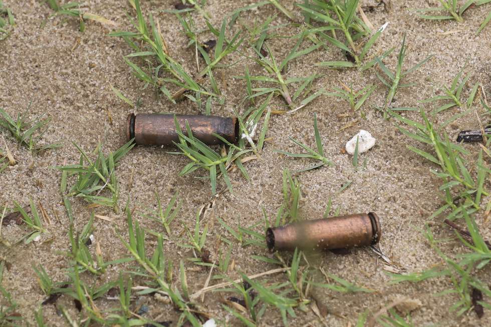 epa09131133 Spent AK rifle capsules in the street of Palma, Cabo Delgado, Mozambique, 12 April 2021. The violence unleashed more than three years ago in Cabo Delgado province escalated again about two weeks ago, when armed groups first attacked the town of Palma.  EPA/JOAO RELVAS