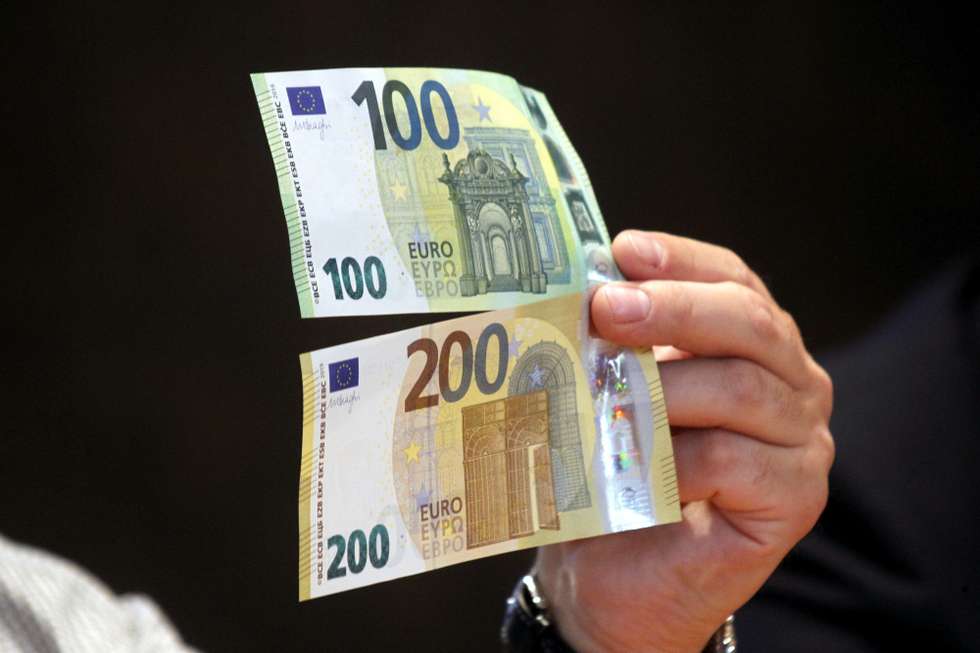epa07596699 A view of new euro banknotes in Riga, Latvia, 24 May 2019. Latvia will be launching new 100 euro and 200 euro banknotes On 28th May 2019. These are the latest European series of banknotes with refurbished design and advanced security features.  EPA/Toms Kalnins
