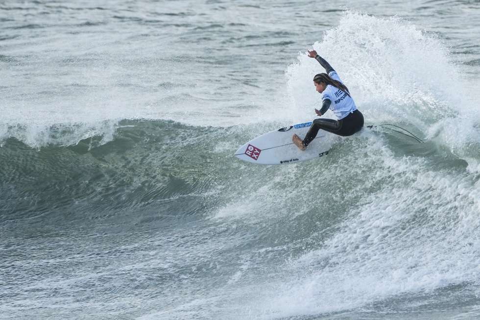 epa11210625 Portuguese surfer Francisca Veselko competes during the World Surfing Championship stage,at Praia dos Super Tubos in Peniche, 10 March 2024.  EPA/Carlos Barroso