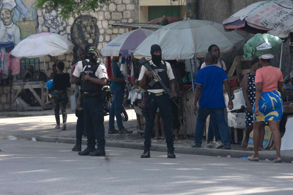 epa13195841 Members of the Haitian National Police patrol a street in Port-au-Prince, Haiti, 27 August 2026. Haiti is preparing to hold elections in December, despite ongoing violence, including an attack on 24 August that killed at least 47 people, amid a wave of violence that claimed more than 3,000 lives in the first six months of the year, according to UN data.  EPA/Jonet St Elois