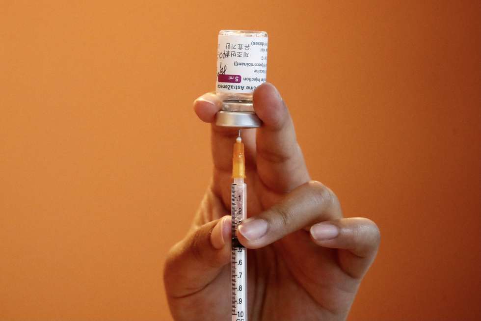 epa09130014 A medical worker prepares a jab of Vaxzevira (formerly AstraZeneca) COVID-19 vaccine in Taoyuan city, Taiwan, 12 April 2021. Taiwan started administering the second batch of COVID-19 vaccine that arrive in the country on 04 April 2021 under COVAX initiative.  EPA/RITCHIE B. TONGO